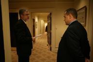 David_Addington_Talks_with_Jim_Nussle_in_West_Wing_Hallway.jpg