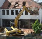 excavators-home-demolition-site-139976.jpg