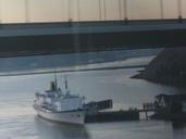 Boat_under_bridge_near_Napa_Valley.jpg