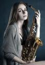 saxophone-girl-portrait-playing-1561556.jpg