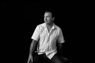 man-shirt-sitting-portrait-1224587.jpg