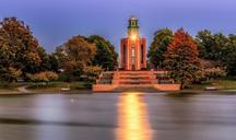 lighthouse-beacon-tranquil-water-581082.jpg