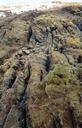 Geologic_formations_revealed_at_low_tide,_Tanjung_Rimau.jpg