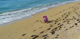 sand-beach-child-beach-holiday-sea-560855.jpg