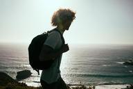 man-hiking-backpack-ocean-beach-918983.jpg