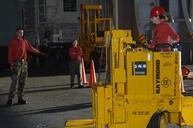 US_Navy_080105-N-9639L-259_Aviation_Ordnanceman_Airman_Hanna_Rains_navigates_an_obstacle_course_to_achieve_forklift_driver_qualifications.jpg