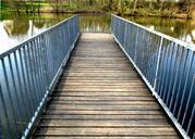 web-boardwalk-railing-waters-pond-299625.jpg