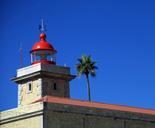 lighthouse-lagos-portugal-red-sky-649231.jpg