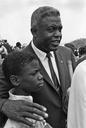 Civil_Rights_March_on_Washington,_D.C._(Former_National_Baseball_League_player,_Jackie_Robinson_with_his_son.)_-_NARA_-_542024.tif