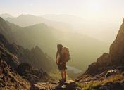 Hiker_with_Backpack_on_Mountain_Landscape.jpg