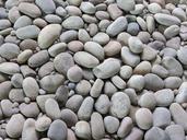 pebbles-stones-pile-beach-scene-1291193.jpg