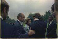 Vice_President_Ford_consoling_David_Eisenhower_as_Nixon_departs_from_the_White_House_-_NARA_-_194598.tif