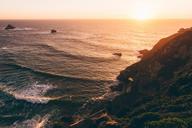 sunset-ocean-waves-cliff-water-1279360.jpg