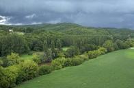 storm-clouds-forest-trees-field-76837.jpg