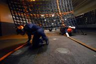 US_Navy_070216-N-5911S-011_Sailors_maneuver_through_an_obstacle_course_during_Damage_Control_Olympics_on_board_amphibious_assault_ship_USS_Boxer_(LHD_4).jpg