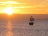 sailboat-sunset-ship-sailing-sea-435448.jpg