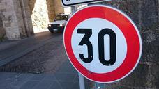 speed-limit-roadsign-car-street-658170.jpg