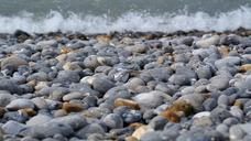 pebble-beach-waves-stones-seaside-1191755.jpg