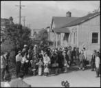 Centerville,_California._Farm_families_of_Japanese_ancestry_await_the_evacuation_buses_which_will_t_._._._-_NARA_-_537577.jpg