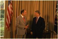 Canadian_President_Pierre_Trudeau_with_Jimmy_Carter_in_the_Oval_Office._-_NARA_-_176148.tif