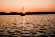 sailboat-motorboat-west-sea-1039036.jpg