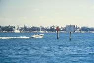 Speed boat racing through idle speed zone area in water protection area.jpg