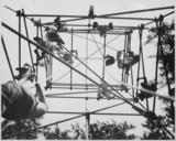 Jeds_on_high_bars_in_obstacle_course._Milton_Hall,_England,_circa_1944.,_1943_-_1944_-_NARA_-_540062.tif