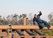 Midshipmen_navigate_Miramar_obstacle_course_during_summer_training_140804-N-BB534-138.jpg