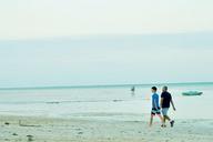 father-son-walk-beach-vacation-393525.jpg