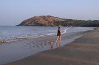 puppy-beach-sand-playing-jogger-631338.jpg