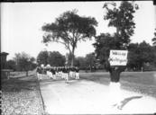 Band_marching_to_Miami-Ohio_Wesleyan_football_game_1921.jpg