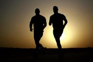 runners-silhouettes-athletes-635906.jpg