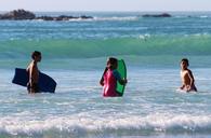 children-beach-swim-surf-surfboard-550836.jpg