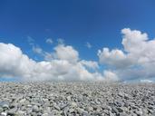 beach-pebbles-landscape-clouds-434356.jpg