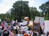 A day without immigrants - protesters, justice for janitors, flags.jpg