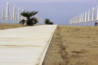 beach-sand-catwalk-umbrellas-725944.jpg