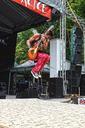 festival-concert-guitarist-jump-865661.jpg