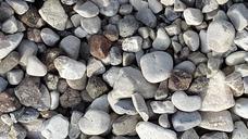 pebbles-stones-tranquil-beach-986022.jpg