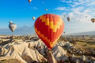 hot-air-balloons-rocks-cliffs-691941.jpg