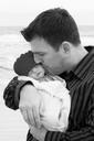 dad-baby-newborn-ocean-kiss-663228.jpg