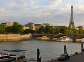 eiffel-tower-seine-river-paris-1062507.jpg