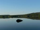 Mirror lake with stone in water.jpg