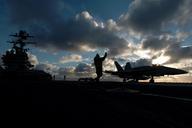 silhouettes-aircraft-carrier-jet-705436.jpg