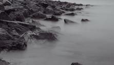 rocks-boulders-coast-mist-grey-923585.jpg