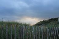 fence-demarcation-dunes-sunset-415657.jpg