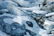 snow-forms-striking-patterns-on-the-old-glacier-ice.jpg