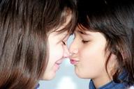 sisters-love-kiss-portrait-smile-1157523.jpg