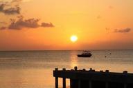 pier-sunset-ocean-sea-scenic-boat-434692.jpg