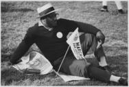 Civil_Rights_March_on_Washington,_D.C._(A_male_marcher_relaxing.)_-_NARA_-_542026.tif