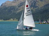 sailboat-passengers-water-mountains-102241.jpg